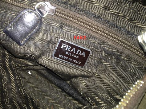 how to tell if prada handbag is real|reproduction prada handbags.